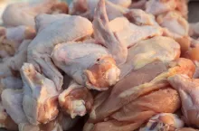 pile of chicken meat in market for sale
