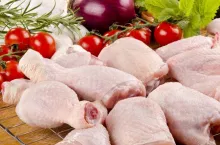 poultry parts before preparation and vegetable