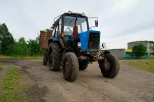 Dirty tractor with the trailer