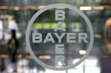 GERMANY - SEPTEMBER 18: The logo of Bayer AG is seen at the entrance of the company‘s headquarters in Leverkusen, Germany, on Wednesday, Sept. 17, 2008. Speculation continues that Pfizer Inc. will bid for the company. (Photo by Wolfgang Von Brauchitsch/Bloomberg via Getty Images)