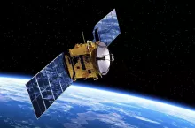 Communication Satellite Orbiting Earth. Realistic 3D Scene.