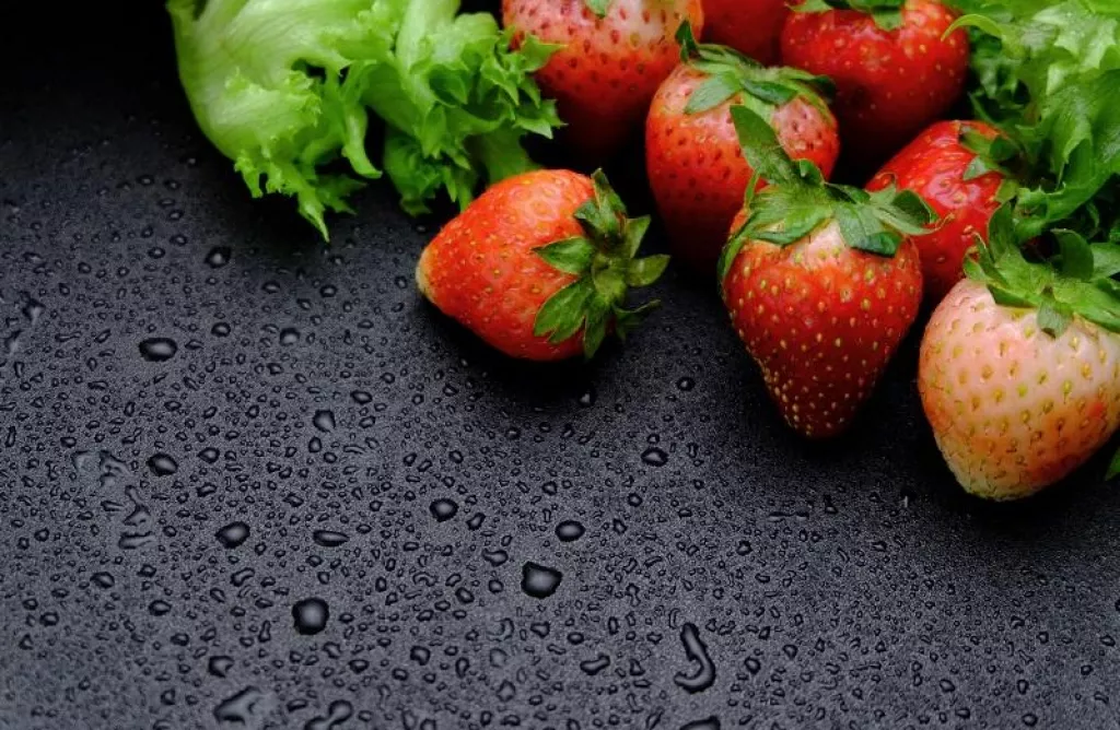 Strawberry and vegetable on wet floor