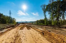 Large view on the sandy road under construction