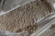 Background blur gray urea pile.