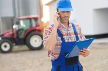 Farmer making some business calls