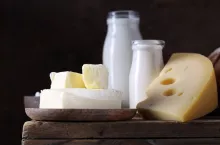 dairy products assortment on wooden board