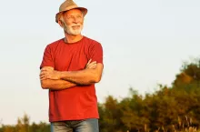 Portrait of a senior elderly man posing outdoors