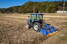 A tractor prepared for cultivating rice