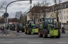 Wolfsburg, Germany - jan 30th 2020: Farmers in Wolfsburg protest against new environmental regulations by driving their tractors to city traffic. Same has happened all over Germany in during winter.