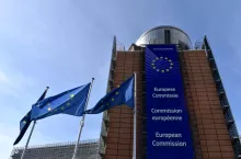 Brussels/Belgium - March 2020: European Commission Building and EU flags