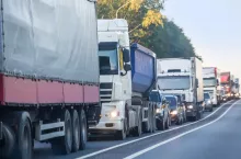 Trucks and cars in a big traffic jam in the country