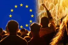 Farmers protest in Europe. Flag, wheat and people background. Farmers‘ protests in Europe.