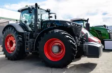 tractor with big wheels, machine for agricultural work and transportation of goods, close-up
